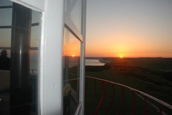 Sunset from Belle Tout lighthouse, Beachy Head, Eeastbourne, by Bob Newton. SUS-210726-114130001