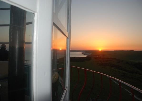Sunset from Belle Tout lighthouse, Beachy Head, Eeastbourne, by Bob Newton. SUS-210726-114130001