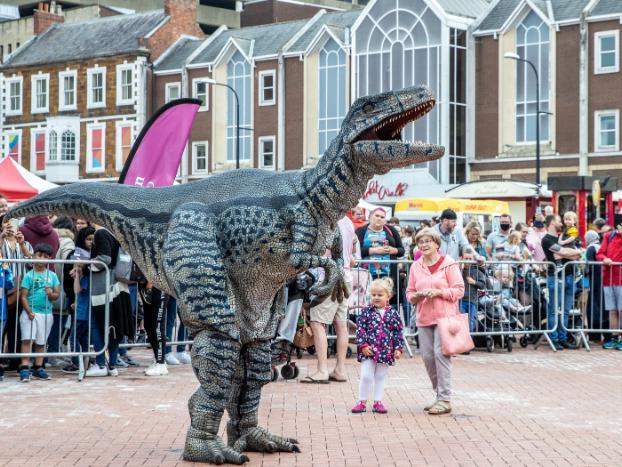 Dinosaurs roamed Northampton town centre to entertain the public on Saturday (July 24). Photo: Kirsty Edmonds