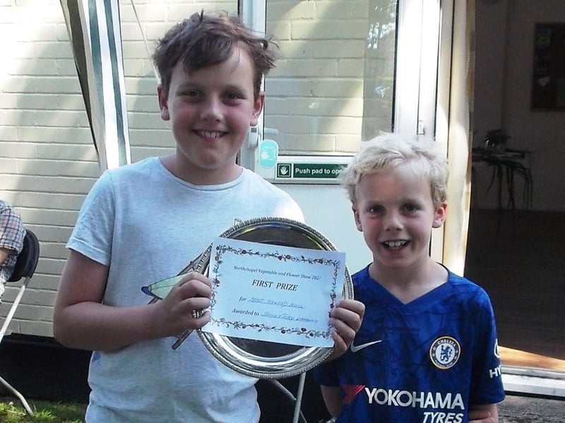 Jamie and Toby Wakely, the young winners of the Valerie Moss Trophy for the most fragrant rose