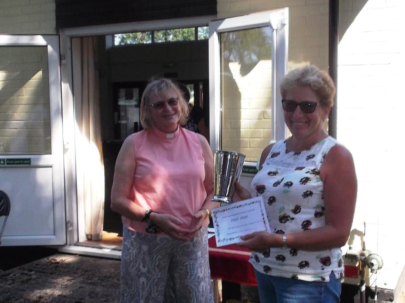 Sue Moss who won the Vivian Trophy for most points gained in the Flower Section