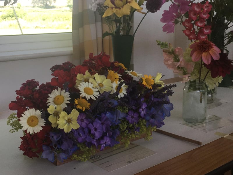 A Rainbow arrangement by Sarah Bound.