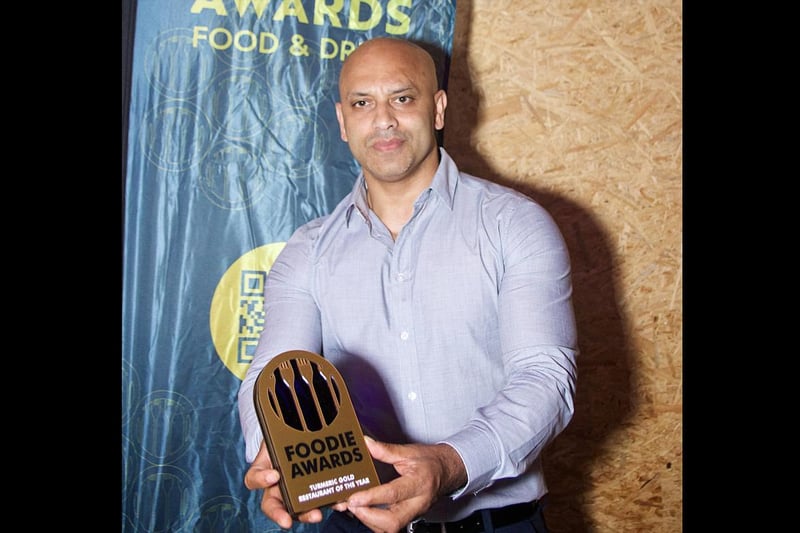 Jay Alam with his Restaurant of the Year Award for Turmeric Gold in Coventry