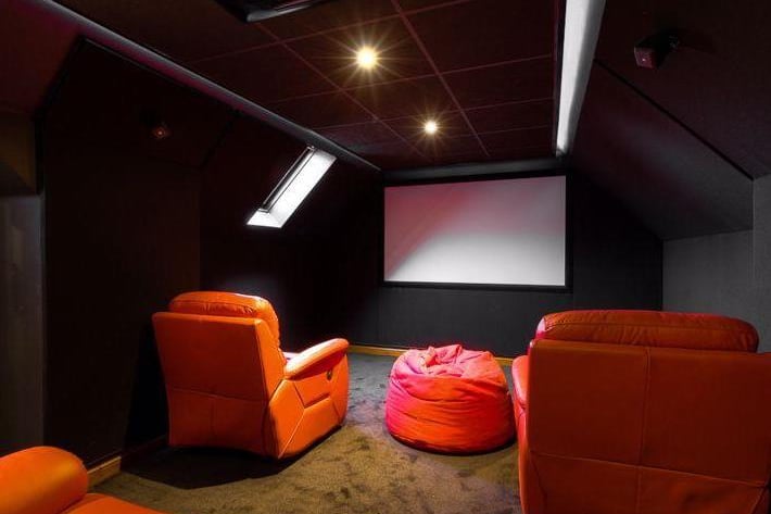 The cinema room has comfy seating