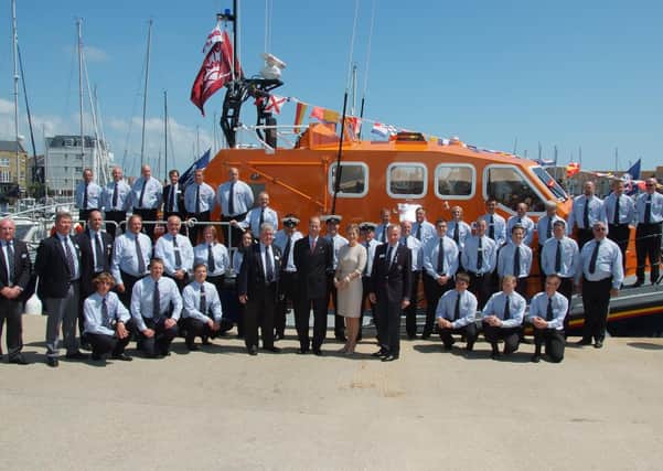 RNLI Eastbourne naming ceremony for new Lifeboat RNLB Diamond Jubilee by The Earl and Countess of Wessex. June 5th 2012 E27133N_corrected
The Earl and Duchess with the crew. ENGSUS00120120607170205