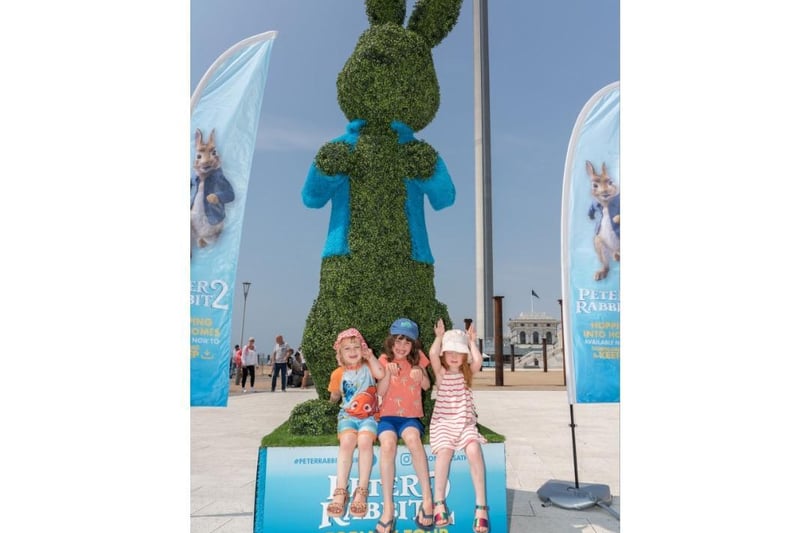 Meeting the Peter Rabbit topiary statue on Brighton beach