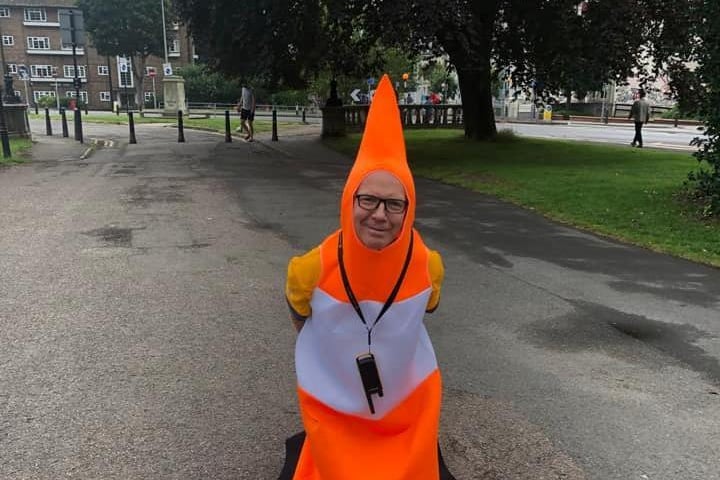 One of the marshals dressed as a human cone at the Preston Park parkrun