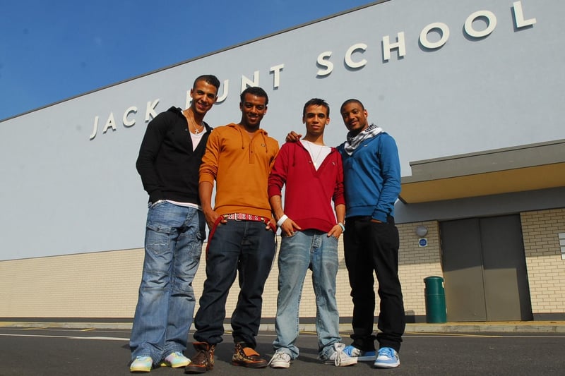 X-Factor contestants JLS perform at Jack Hunt School . 
Pictured are Aston Merrygold (former Jack Hunt pupil), JB (blue top), Oritse (yellow top), Marvin (black top)