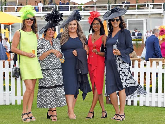 A group of ladies from Brighton enjoy a fabulous Ladies' Day at Glorious Goodwood / Picture: Malcolm Wells