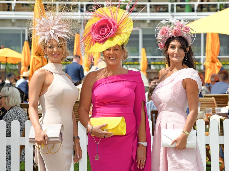 Katie Houghton, Lorna Bruce and the well-known hat designer Ilda Di Vico enjoy Ladies' Day at Glorious Goodwood / Pictures: Malcolm Wells