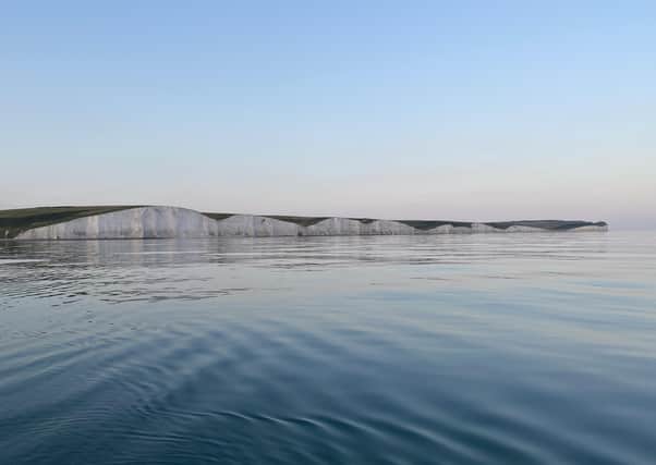 A beautiful evening to be out on a boat. Lisa Pickard took this shot of the Seven Sisters and Beachy Head with an  iPhone 11 Pro Max. SUS-210730-103726001