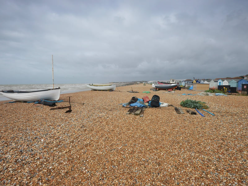 View of Bulverhythe Beach, St Leonards. SUS-210730-104506001