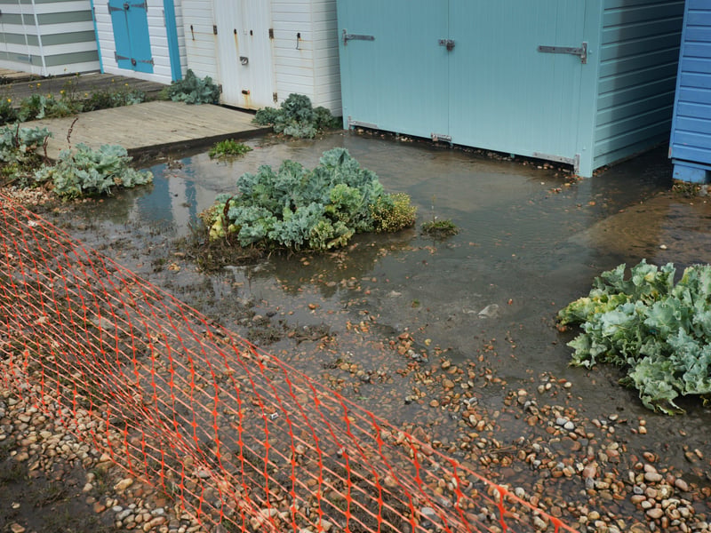 Burst sewage main down Cinque Ports Way, Bulverhythe Beach area, St Leonards. SUS-210730-104753001