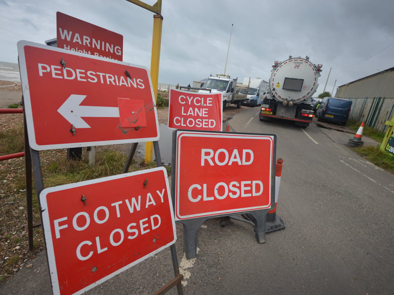 Burst sewage main down Cinque Ports Way, Bulverhythe Beach area, St Leonards. SUS-210730-104807001