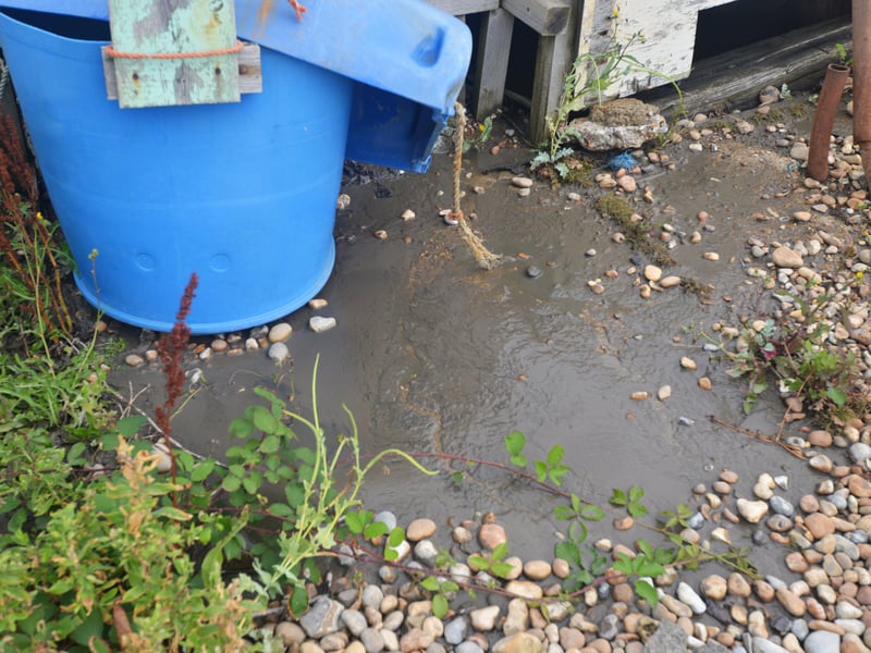 Burst sewage main down Cinque Ports Way, Bulverhythe Beach area, St Leonards. SUS-210730-104655001