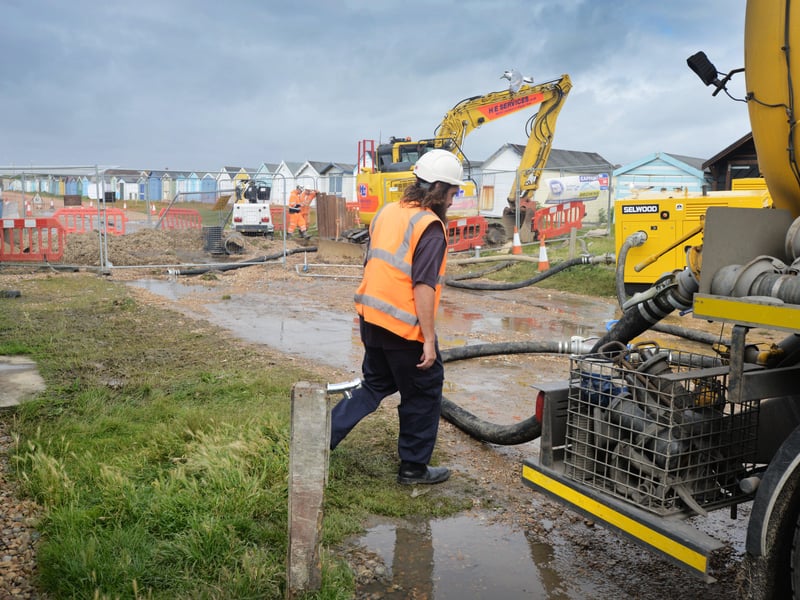 Burst sewage main down Cinque Ports Way, Bulverhythe Beach area, St Leonards. SUS-210730-104319001
