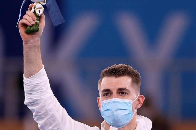 It was definitely all smiles under the mask for Max Whitlock after he received his gold medal