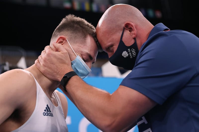 Max Whitlock was congratulated by his coach Scott Hann after his winning routine