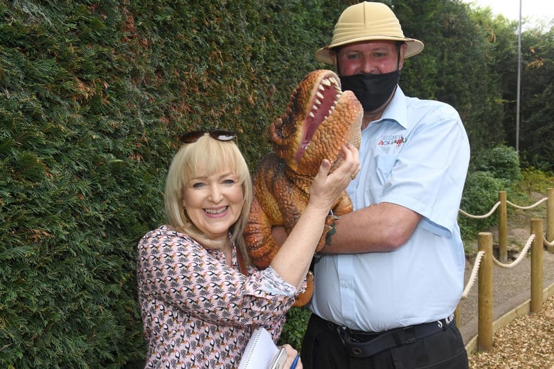 Reporter Chrissie Redford meeting Baby Dino Rex and Richard the Ranger.