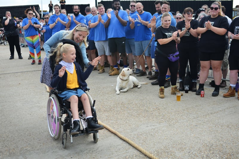 Hastings Old Town Carnival Week 2021.
Tug o' War outside the lifeboat station 31/7/21

Willow Curtis with her mum April. SUS-210731-140156001