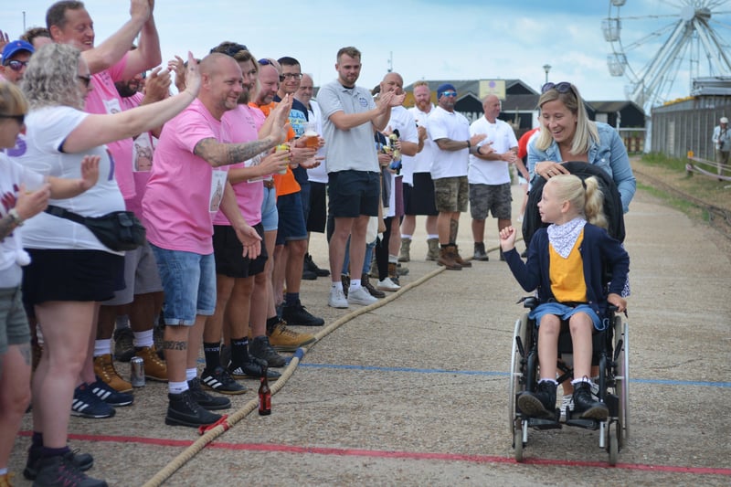 Hastings Old Town Carnival Week 2021.
Tug o' War outside the lifeboat station 31/7/21

Willow Curtis with her mum April. SUS-210731-140143001