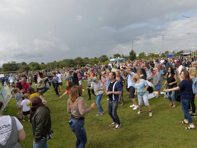 People enjoying the festival. (Photo by Jon Rigby)