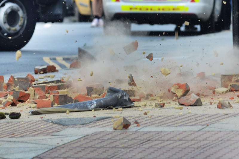 Loose bricks falling from the old Queensbury House building in Hastings. Pic Justin Lycett SUS-210308-150829001