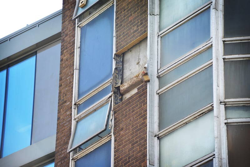 Loose bricks falling from the old Queensbury House building in Hastings. Pic Justin Lycett SUS-210308-151129001