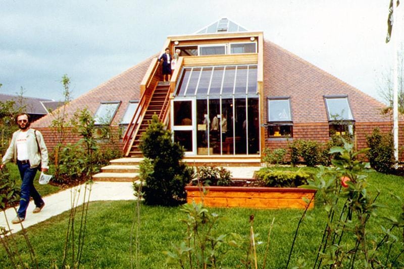 The Pyramid House was designed by Wigley Fox architects. It is an upside down house with the lounge upstairs and a glass roof, which has steps leading down to the garden. It was built with a basement that “could be used as a fall-out shelter”.
The house was featured in an episode of the BBC makeover series Home Front with Laurence Llewelyn-Bowen and Diarmuid Gavin in 2003.  The cladding was replaced a few years ago.
