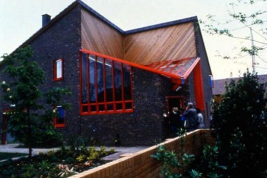 This was the BBC's Money Programme house. It has passive solar gain from the double glazing and conservatory, and also an active solar gain from the panels on the roof. It was fuelled by the The Totem total energy module – an adapted car engine that became a propane gas-fuelled generator capable of supplying enough energy for around 10 houses.