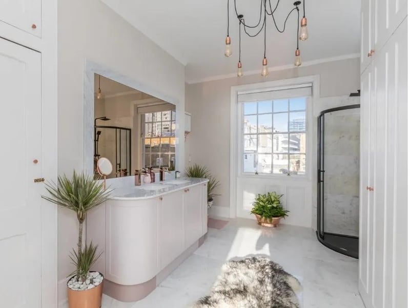 The bathroom adjacent to master bedroom
