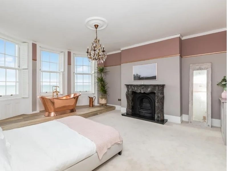 Master bedroom with bath and sea view