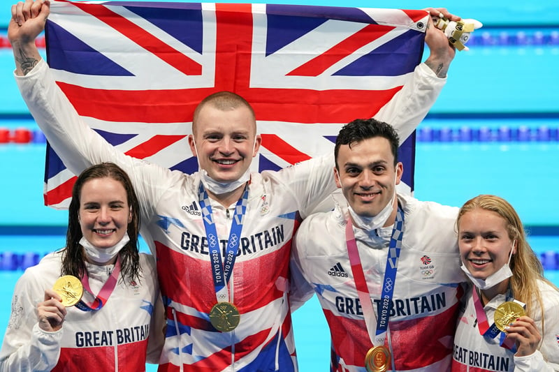 Anna Hopkin (right) with fellow relay gold medal winners Kathleen Dawson, Adam Peaty and James Guy PA Wire/PA Images.
