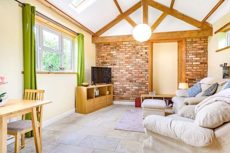 This renovated farmhouse with an annexe and a separate cottage is on the market for under 1.5 million. 
Listed by Carter Jonas, marketed by Rightmove.