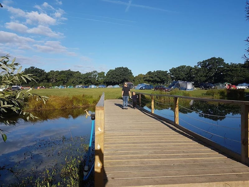 Blacklands campsite at Henfield, West Sussex is set in oak-enclosed meadows with picturesque countryside near the South Downs and Brighton.