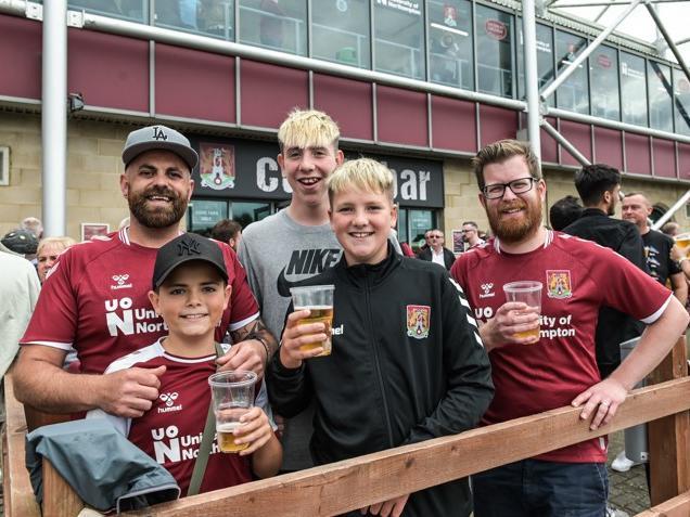 Cobblers fan outside the PTS Academy Stadium on Saturday (August 7). Photo: Louise Smith