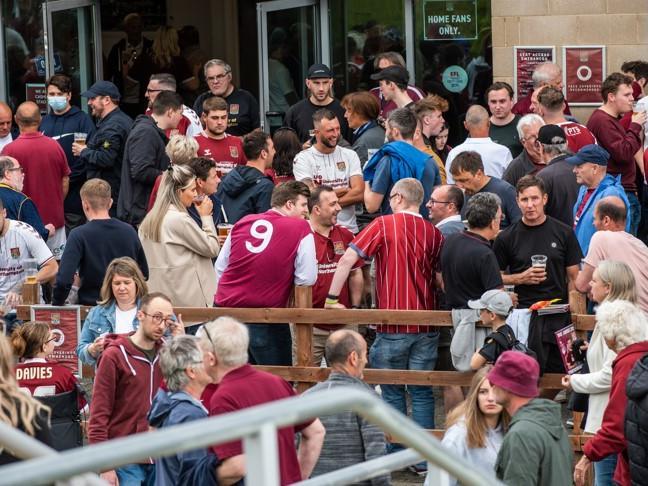 Cobblers fan outside the PTS Academy Stadium on Saturday (August 7). Photo: Louise Smith