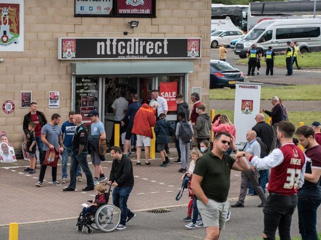 Cobblers fan outside the PTS Academy Stadium on Saturday (August 7). Photo: Louise Smith