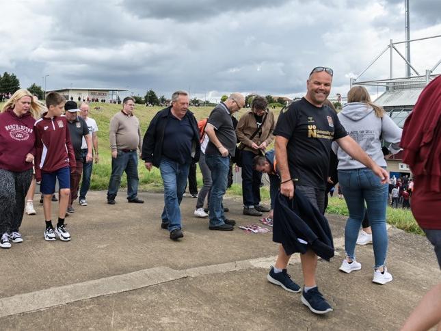 Cobblers fan outside the PTS Academy Stadium on Saturday (August 7). Photo: Louise Smith