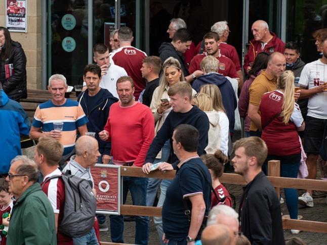 Cobblers fan outside the PTS Academy Stadium on Saturday (August 7). Photo: Louise Smith