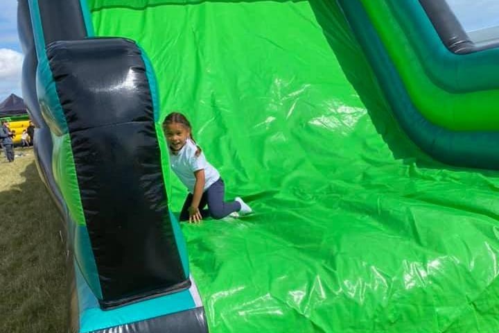 The inflatable assault course was particularly popular with children.