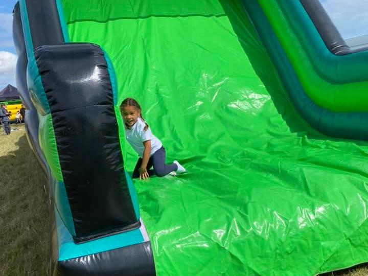 The inflatable assault course was particularly popular with children.