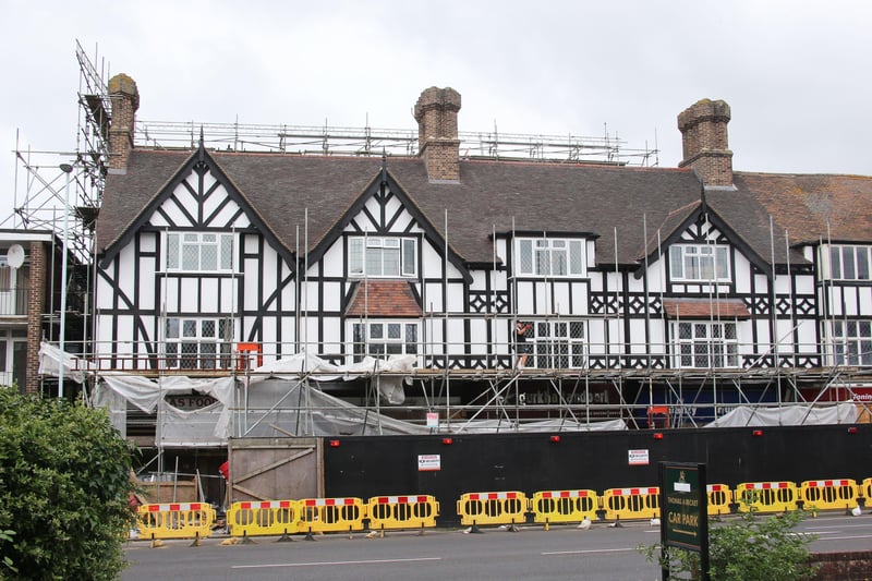 Flats and shops opposite The Thomas A Becket pub in Worthing have been rebuilt following a fire in 2018