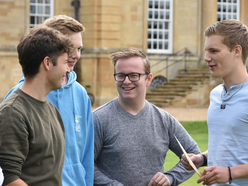 James Gibbons (from Woodnewton) discussing results with friends