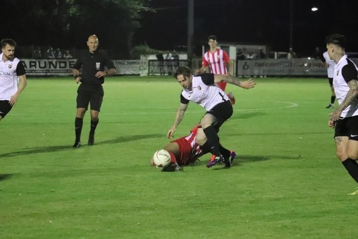 Action from the FA Cup extra preliminary round replay at Pagham, which Steyning won 3-2 / Picture: Roger Smith