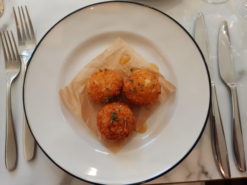 Goats cheese croquettes with South Downs honey and thyme