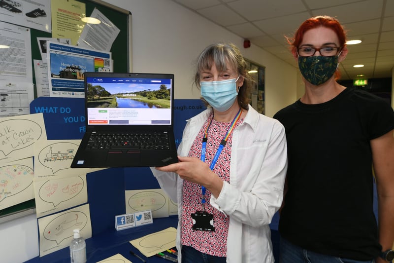 Millfield Festival.    Susan Davidson and Trish Barker-Barrett from How Are You Peterborough looking at the NHS Wellbeing website at Gladstone Community Centre. EMN-210808-164127009