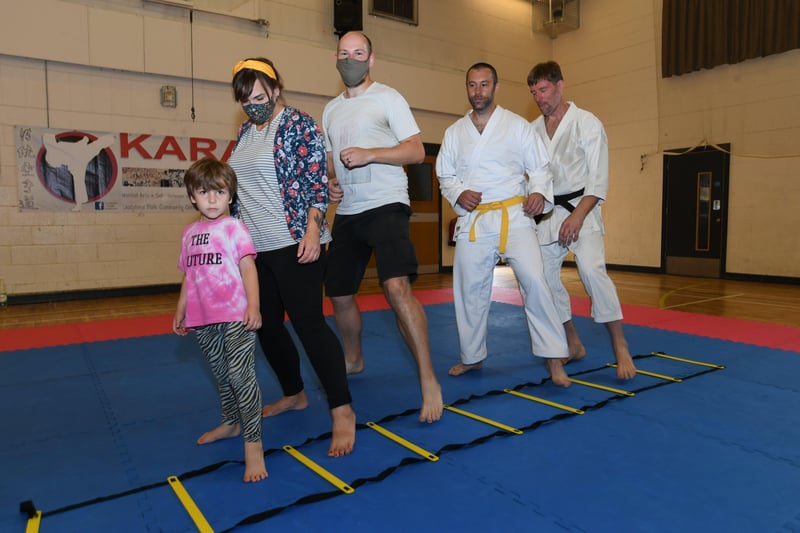 Millfield Festival.   Alex Hackney-Williams with  Vicky and Ben Hackney-Williams at a karate try-it session with Pawel Kutermankiewicz and Stephen Rotondo from the Traditional Karate Club, Peterborough at Gladstone Community Centre. EMN-210808-164351009