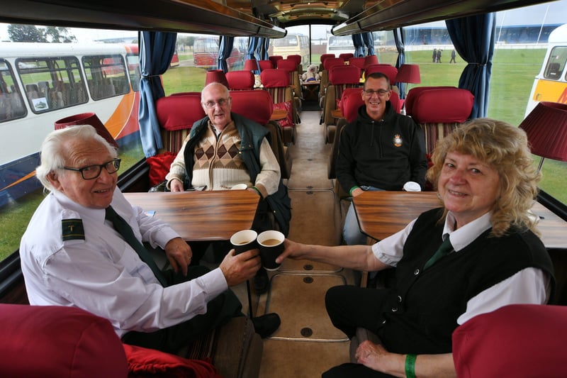 The Buses Festival at the East of England Arena. Ron and Anne Atherton with Paul Mather and Les Williamson aboard  Anne's luxury coach EMN-210808-164457009