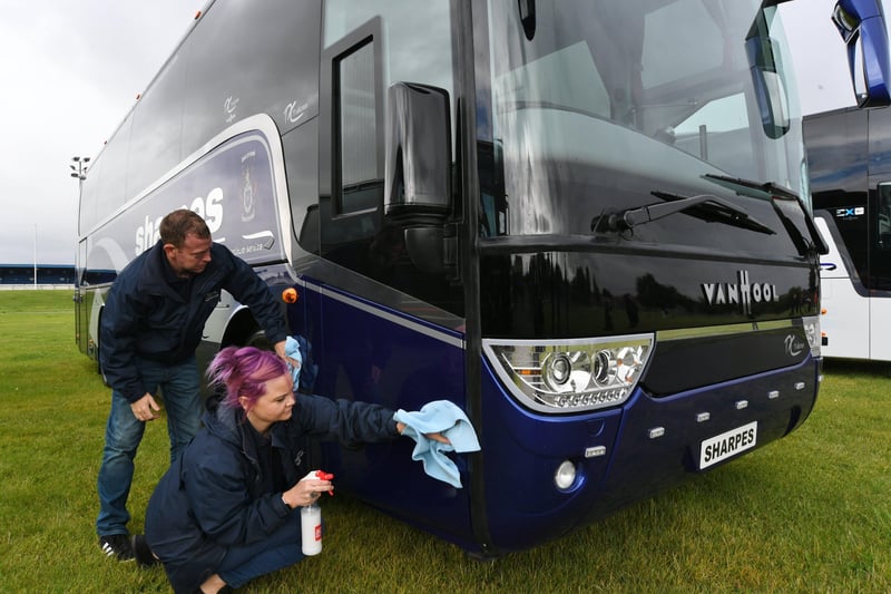 The Buses Festival at the East of England Arena. Nathan Keywood and Rebecca Newman doing a spot of polishing EMN-210808-164519009